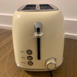Beautiful cute cream color toaster machine